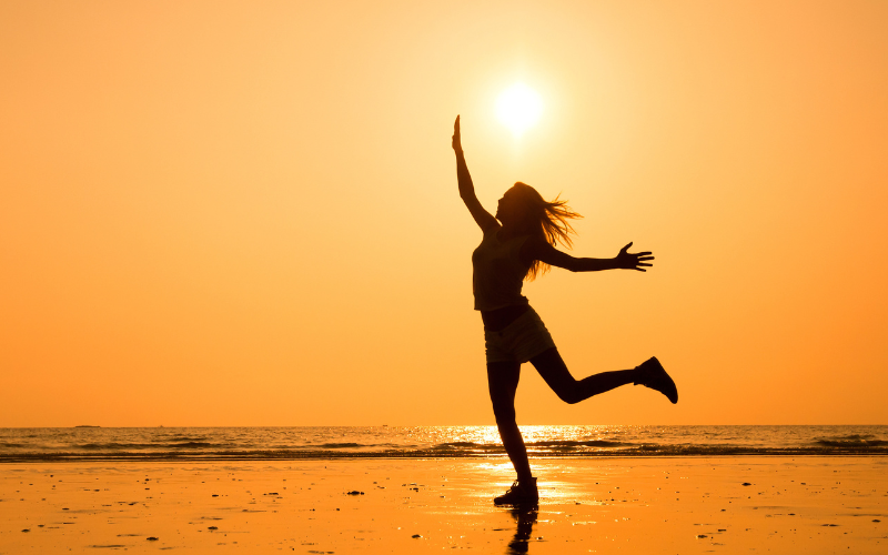 Woman jumping in happiness