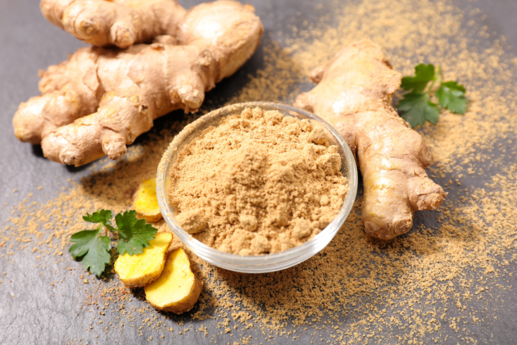 Ginger being crushed into bowl