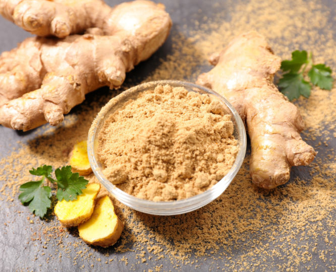 Ginger being crushed into bowl